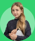 Middle school student with long blonde hair holding a laptop on a green background.