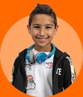 Young primary school student smiling with headphones on an orange background.